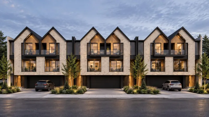 Illustrative townhome row with gabled roofs, warm lighting and front garages.